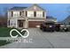 Two-story house with neutral siding, covered entrance, and two-car garage at 804 Seabreeze Dr, Avon, IN 46123