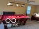Spacious game room with a pool table under ceiling fan lighting at 804 Seabreeze Dr, Avon, IN 46123