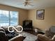 Comfortable living room with natural light, plush seating, and dark hardwood flooring creating a cozy atmosphere at 804 Seabreeze Dr, Avon, IN 46123