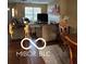 Bright living room featuring hardwood floors, fireplace and comfortable furniture at 804 Seabreeze Dr, Avon, IN 46123