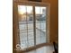 View of patio with sliding glass door showing a fenced in yard with a pool beyond at 804 Seabreeze Dr, Avon, IN 46123