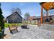 Backyard with patio area, a fire pit, and outdoor seating arrangement perfect for relaxation at 807 E Minnesota St, Indianapolis, IN 46203