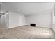 Spacious carpeted basement featuring recessed lighting, a window, and a wooden chest for storage at 807 E Minnesota St, Indianapolis, IN 46203