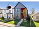 Attractive home with charcoal gray siding, natural wood accents and a small front yard at 807 E Minnesota St, Indianapolis, IN 46203