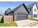 Garage and driveway, complementing the house's exterior and adding functional space at 807 E Minnesota St, Indianapolis, IN 46203