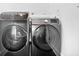 This laundry area features a set of sleek Samsung washer and dryer units at 807 E Minnesota St, Indianapolis, IN 46203