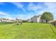 Backyard featuring grassy area and a swing set at 8531 Aberdeenshire Ct, Indianapolis, IN 46259