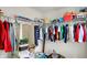 Spacious walk-in closet with ample storage and clothing racks at 8531 Aberdeenshire Ct, Indianapolis, IN 46259