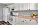 A great kitchen features white cabinets, countertops, and stainless appliances at 8531 Aberdeenshire Ct, Indianapolis, IN 46259