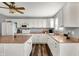 A gorgeous kitchen includes white cabinets, and a spacious island at 8531 Aberdeenshire Ct, Indianapolis, IN 46259