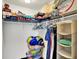 Walk-in closet includes shelving and clothes racks for ample storage at 8531 Aberdeenshire Ct, Indianapolis, IN 46259