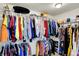 Walk-in closet providing ample storage with racks and shelving for organized clothing and accessories at 8531 Aberdeenshire Ct, Indianapolis, IN 46259
