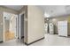 Basement space with water heaters and a refrigerator, providing ample storage at 8560 N College Ave, Indianapolis, IN 46240