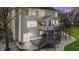 Beautiful backyard with a spacious deck, screened in porch, and a staircase leading to the yard at 9789 Logan Ln, Fishers, IN 46037