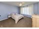 Bright bedroom with modern decor featuring two large windows with curtains and light colored walls at 9789 Logan Ln, Fishers, IN 46037