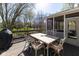 Outdoor dining on deck complete with table and chairs perfect for entertaining guests at 9789 Logan Ln, Fishers, IN 46037