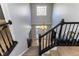 Grand foyer showcasing a staircase and chandelier creates a stunning first impression for visitors at 9789 Logan Ln, Fishers, IN 46037
