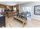 Charming kitchen with wood cabinets, stainless steel appliances, and an island, perfect for cooking and entertaining at 9789 Logan Ln, Fishers, IN 46037