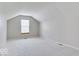Spacious bedroom features neutral carpet and paint and a window at 9844 Plantana Blvd, Fishers, IN 46038