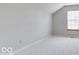 Bedroom with neutral carpet and paint and a window at 9844 Plantana Blvd, Fishers, IN 46038