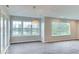 Large living area features wood floors, recessed lights, chandelier, and scenic backyard views at 9844 Plantana Blvd, Fishers, IN 46038