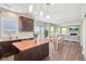Open kitchen boasts an island, dining area, and living room, great for modern living at 9916 Gallop Ln, Fishers, IN 46040
