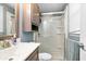Bathroom with new vanity, sink, toilet, storage cabinet, and glass shower doors at 10533 Williamsburg Dr, Newburgh, IN 47630