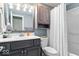 Bathroom with new vanity, sink, toilet, cabinet, and shower with curtain at 10533 Williamsburg Dr, Newburgh, IN 47630
