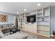 Inviting living area with custom built-ins, ideal for entertainment and organized living at 10533 Williamsburg Dr, Newburgh, IN 47630
