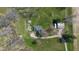 Overhead aerial view of home with outbuildings and long driveway at 11015 S State Road 58, Columbus, IN 47201