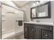 Modern bathroom features a shower stall and stylish vanity at 11674 Buttonwood Dr, Carmel, IN 46033