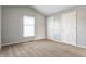 Bright bedroom with large window and closet space at 11674 Buttonwood Dr, Carmel, IN 46033