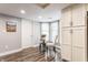 Cozy dining area with updated lighting and ample natural light at 11674 Buttonwood Dr, Carmel, IN 46033