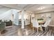 Open-concept living space featuring a dining area, living room, and modern decor at 11674 Buttonwood Dr, Carmel, IN 46033