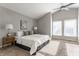 Spacious main bedroom with natural light, carpet and vaulted ceiling at 11674 Buttonwood Dr, Carmel, IN 46033