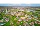 Overhead photo displays a neighborhood with verdant lawns and a mix of single-Gathering homes near community amenities at 118 Presidential Ct, Greenfield, IN 46140