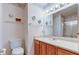 Bathroom with vanity, toilet, mirror and shower with glass doors at 118 Presidential Ct, Greenfield, IN 46140
