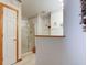 En-suite bathroom area featuring a glass-enclosed shower and neutral decor at 118 Presidential Ct, Greenfield, IN 46140