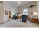 Open living room with carpet flooring, vaulted ceiling and furniture at 118 Presidential Ct, Greenfield, IN 46140