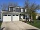 Charming two-story home with a well-maintained lawn and a two car garage at 12458 Trumbull Ct, Fishers, IN 46038