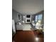 Spacious living room with wood floors and a decorative fireplace at 12458 Trumbull Ct, Fishers, IN 46038