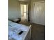Bright bedroom with closet and a bench at the end of the bed at 12802 Ari Ln, Fishers, IN 46037
