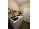Functional laundry room with washer, dryer and shelving at 12802 Ari Ln, Fishers, IN 46037