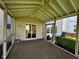 Relaxing screened-in porch with ceiling fan and natural light at 12802 Ari Ln, Fishers, IN 46037