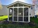 A well-built screened porch features an open design and seamless transition to the backyard at 12802 Ari Ln, Fishers, IN 46037