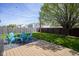 Spacious backyard featuring a fire pit area and well-maintained lawn at 14203 Cliffwood Pl, Fishers, IN 46038