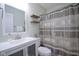 Clean bathroom with white vanity, updated fixtures, and a stylish shower curtain at 14203 Cliffwood Pl, Fishers, IN 46038