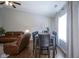 Open-concept living room and dining room area filled with natural light at 14203 Cliffwood Pl, Fishers, IN 46038