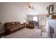 Comfortable living room with a ceiling fan and lots of natural light at 14203 Cliffwood Pl, Fishers, IN 46038