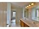 Bright bathroom with double vanity and lots of light at 14538 Baldwin Ln, Carmel, IN 46032
